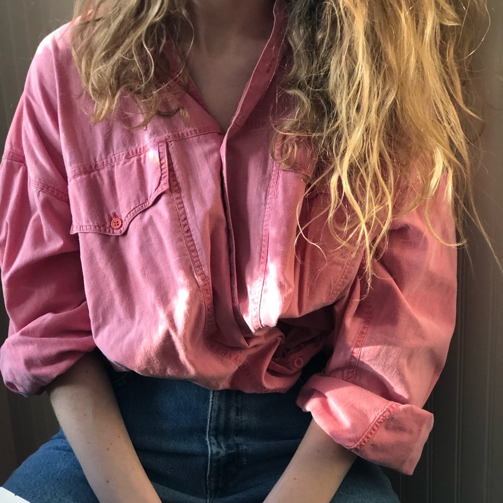 a rustic red button down shirt